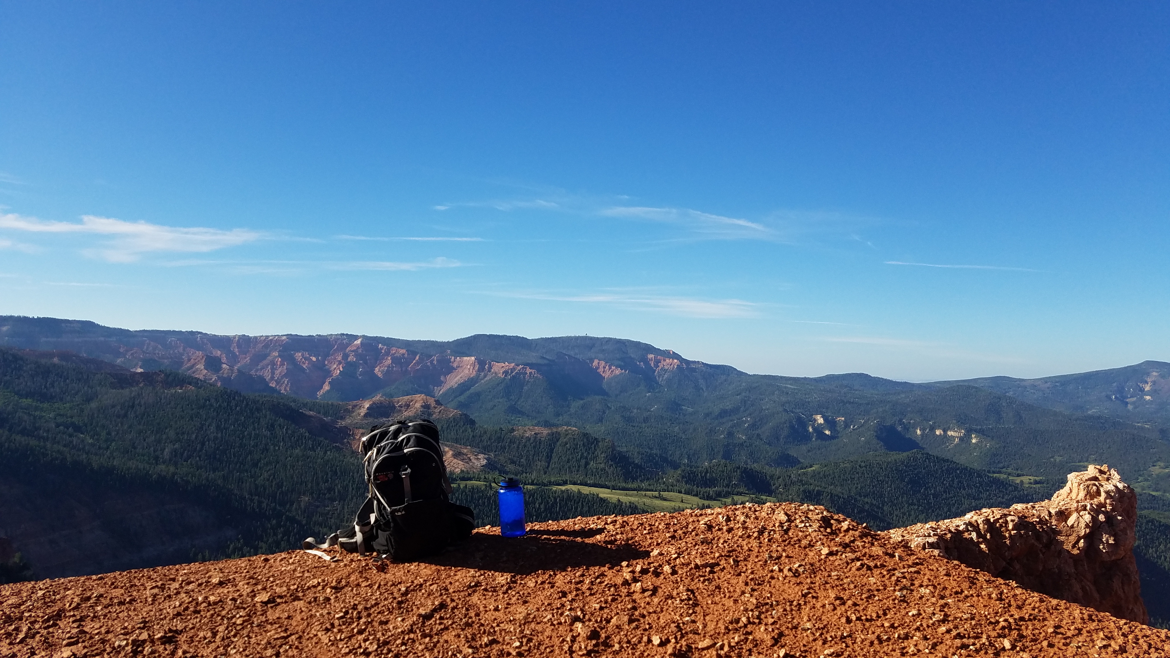 Backpack on a cliff